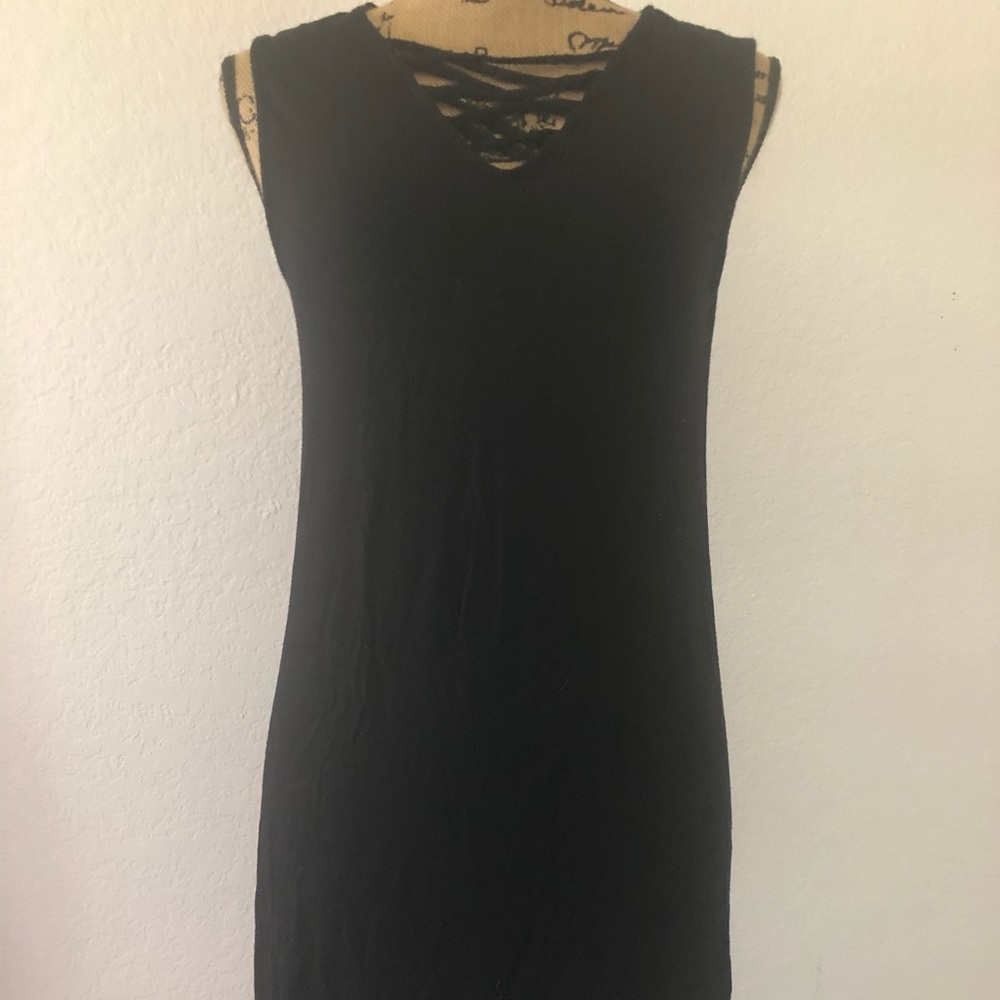 Black trust with  crossing in front